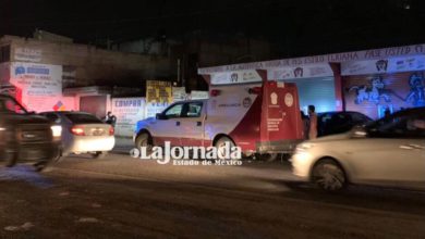 Camioneta SEMEFO en lugar de los hechos de un homicidio en Lerma